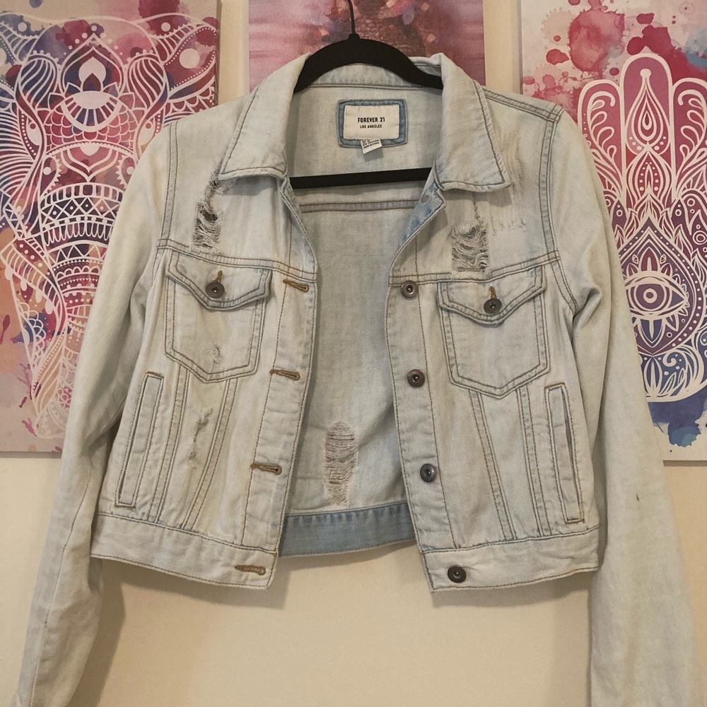 Denim jacket washed out style.